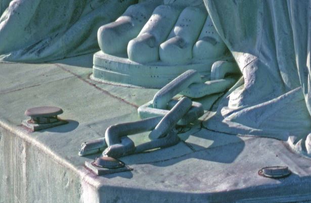 SOL, shackles, foot, Statue of Liberty 