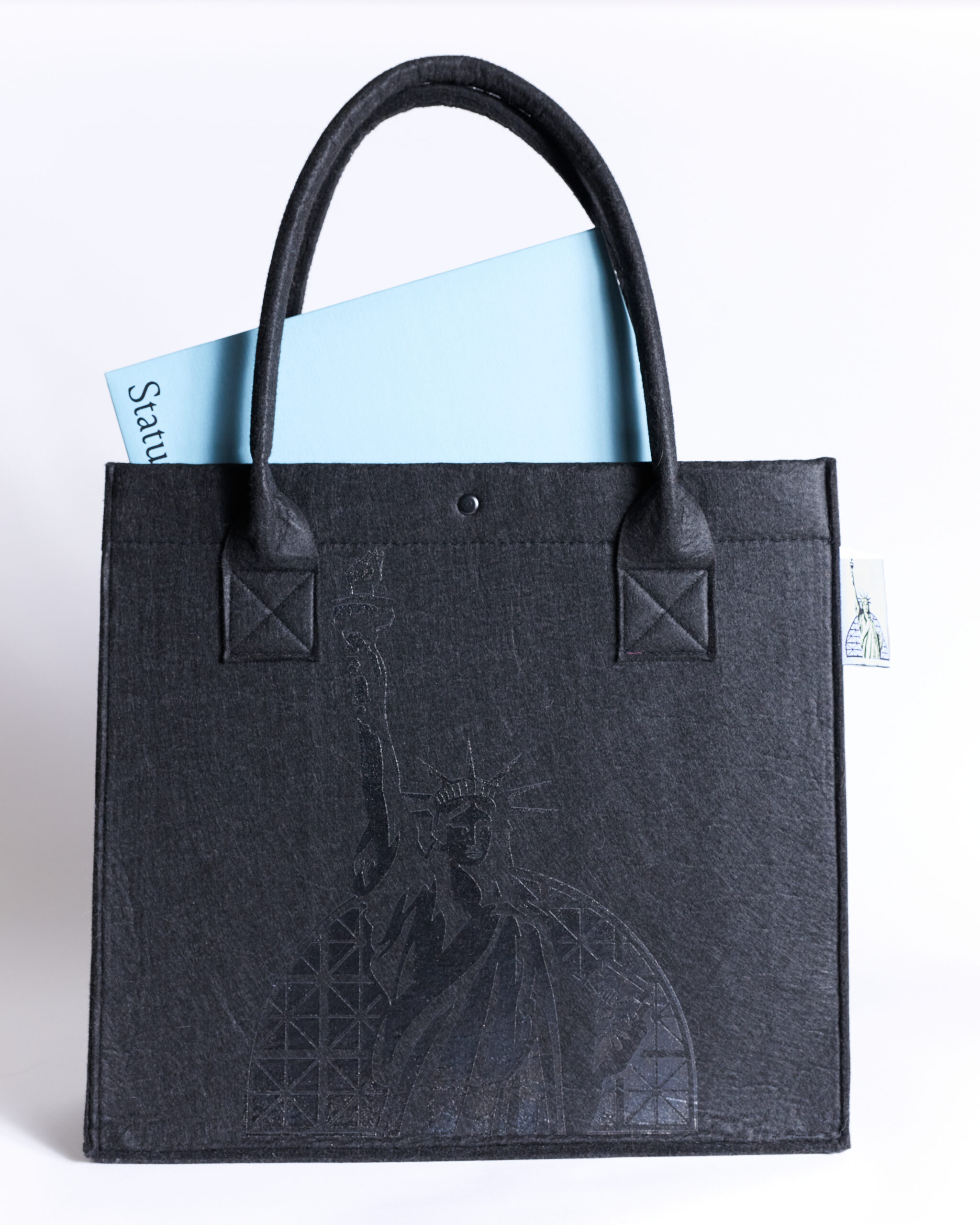 Tote bag with document holder inside.